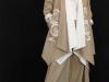 Manteau en double beige brodé 300€, blanc 185€